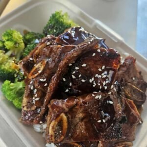 Korean short rib BBQ over steamed rice and broccoli